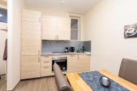A kitchen or kitchenette at Comfortable romantic 1 bedroom apartment near Augarten