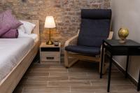A bed or beds in a room at Comfortable romantic 1 bedroom apartment near Augarten