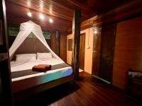 Postel nebo postele na pokoji v ubytování Khao Sok Silver Cliff Resort