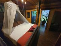 Postel nebo postele na pokoji v ubytování Khao Sok Silver Cliff Resort