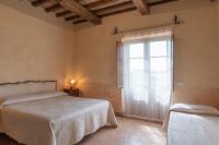 Posteľ alebo postele v izbe v ubytovaní Agriturismo Tenuta Roccaccia