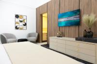 TV a/nebo společenská místnost v ubytování Apartment Savannah