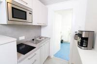 Kuchyňa alebo kuchynka v ubytovaní Seeappartements Christiane Haus 97