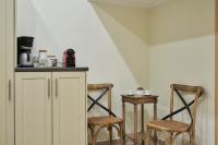 A kitchen or kitchenette at Spirou Merkouri Handcrafted 2BD Home