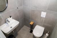 Kúpeľňa v ubytovaní Rivus Apartments