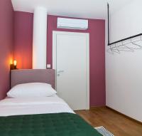 Posteľ alebo postele v izbe v ubytovaní Rivus Apartments