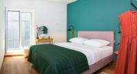 Posteľ alebo postele v izbe v ubytovaní Rivus Apartments