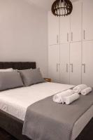 A bed or beds in a room at Sfakion 6 apartment