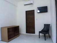 TV a/nebo společenská místnost v ubytování Room in Condo - Malecon Cozy - Premium Plus 19