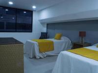 Postel nebo postele na pokoji v ubytování Room in Condo - Malecon Cozy - Premium Plus 19