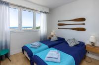 Plan piętra w obiekcie Appartement face à la mer