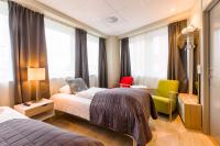 Postel nebo postele na pokoji v ubytování Corner Hotell