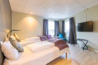 TV a/nebo společenská místnost v ubytování Corner Hotell