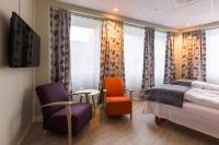 Postel nebo postele na pokoji v ubytování Corner Hotell