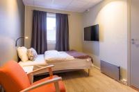 Postel nebo postele na pokoji v ubytování Corner Hotell