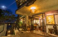a building with a large glass door with at Panviman Resort Koh Phangan - SHA Extra Plus in Thong Nai Pan Noi