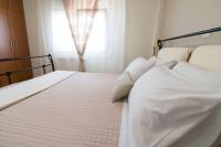 Posteľ alebo postele v izbe v ubytovaní Ionian View Apartment