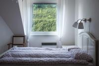 Łóżko lub łóżka w pokoju w obiekcie Štýlový apartmán v srdci Donovalov