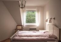Łóżko lub łóżka w pokoju w obiekcie Štýlový apartmán v srdci Donovalov