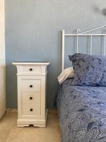 A bed or beds in a room at Hotel Medina Centro