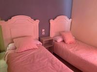 A bed or beds in a room at Hotel Medina Centro