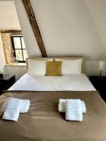 Posteľ alebo postele v izbe v ubytovaní Loft à Pont-Aven, Vue panoramique sur l'Aven