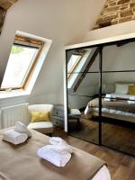 Posteľ alebo postele v izbe v ubytovaní Loft à Pont-Aven, Vue panoramique sur l'Aven