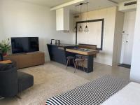 Telewizja i/lub zestaw kina domowego w obiekcie LuxLux Apartments Sand