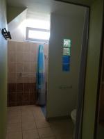 a bathroom with a shower and a toilet at Launie Lea in Eyzerac