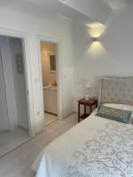 Posteľ alebo postele v izbe v ubytovaní Apartman Priko 63A
