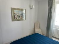 Posteľ alebo postele v izbe v ubytovaní Apartman Priko 63A