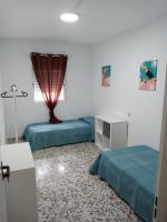 Postel nebo postele na pokoji v ubytování Casa Maria