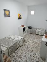 Postel nebo postele na pokoji v ubytování Casa Maria