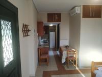 A kitchen or kitchenette at Papadeas Villas