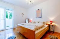 Posteľ alebo postele v izbe v ubytovaní Marinero Apartment