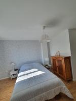 Posteľ alebo postele v izbe v ubytovaní appartement rénové et lumineux a mers les bains au dessus d'un ancien commerce mersois en duplex pour 4 personnes pour du repos, des vacances ou pour le travail