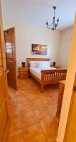 Postel nebo postele na pokoji v ubytování Casa Ladena