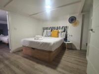 Posteľ alebo postele v izbe v ubytovaní ISG Apartments Feria 106