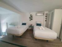 Posteľ alebo postele v izbe v ubytovaní ISG Apartments Feria 106