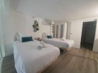 Posteľ alebo postele v izbe v ubytovaní ISG Apartments Feria 106