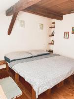 Postel nebo postele na pokoji v ubytování Rodinné apartmány Angelika