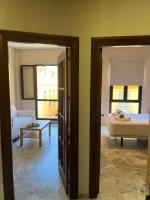 A bed or beds in a room at Premium Center Alameda