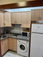 A kitchen or kitchenette at Premium Center Alameda