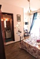 Kuchyň nebo kuchyňský kout v ubytování B&B Antonella