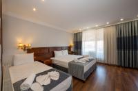 Postel nebo postele na pokoji v ubytování Valdivia Hotel Sultanahmet