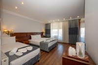 Postel nebo postele na pokoji v ubytování Valdivia Hotel Sultanahmet