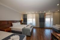 Postel nebo postele na pokoji v ubytování Valdivia Hotel Sultanahmet