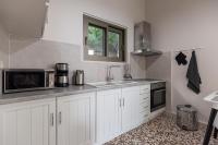 Kuchyň nebo kuchyňský kout v ubytování Villa Magdalena
