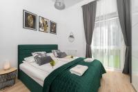Posteľ alebo postele v izbe v ubytovaní Exclusive Apartment Kajdasza Wroclaw by Noclegi Renters