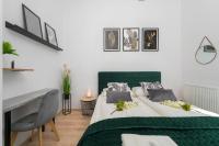 Posteľ alebo postele v izbe v ubytovaní Exclusive Apartment Kajdasza Wroclaw by Noclegi Renters